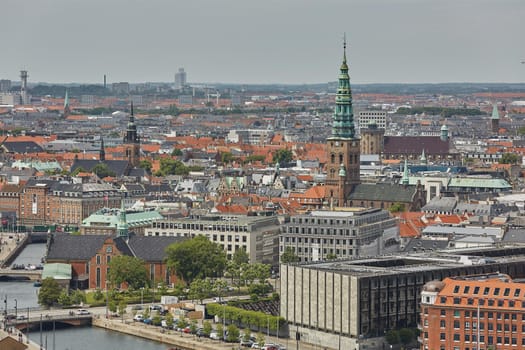 Skyline of scandinavian city of Copenhagen in Denmark during a cloudy day.