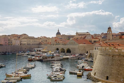 DUBROVNIK, CROATIA - OCTOBER 10, 2017: View of the bay, port and old town of Dubrovnik, Croatia.