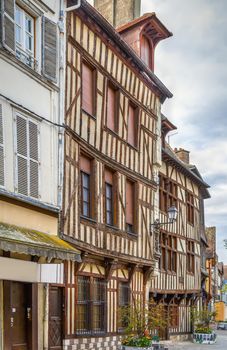 Street with historical half-timbered houses in Troyes, France