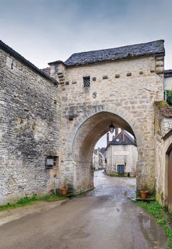 Gate in old wall in Noyers (Noyers-sur-Serein), France