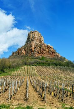 Rock of Solutre (French: Roche de Solutre), is a limestone slope 8 km west of Macon, France