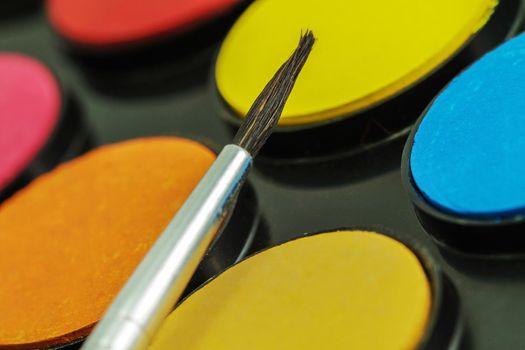 Close up of Water color paints and brush