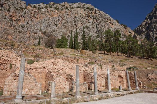 Ruins of Delphi is ancient sanctuary that grew rich as seat of oracle that was consulted on important decisions throughout ancient classical world. UNESCO World heritage.