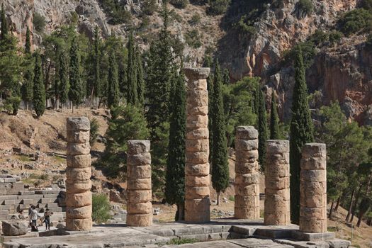 Apollo Temple in Delphi, an archaeological site in Greece, at the Mount Parnassus. Delphi is famous by the oracle at the sanctuary dedicated to Apollo. UNESCO World heritage.