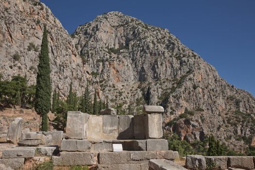 Ruins of Delphi is ancient sanctuary that grew rich as seat of oracle that was consulted on important decisions throughout ancient classical world. UNESCO World heritage.