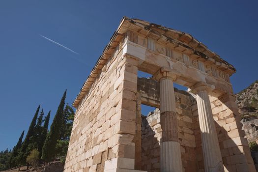 Athenian Treasure in Delphi, Greece, ancient sanctuary that grew rich as seat of oracle that was consulted on important decisions throughout ancient classical world. UNESCO World heritage.