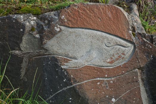 Image of whale chiseled into rocks, Qaqortoq Greenland.