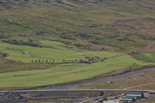 Small town of Eskifjodur located in east Iceland is surrounded by beautiful landscapes.