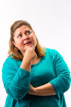 Portrait of fatty woman with her hand on chin thinking