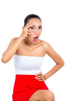 Portrait of a woman making funny face over white background