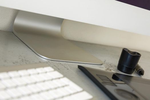 Close Up of Computer, Keyboard and Graphic Tablet with Shallow Depth Of Field.