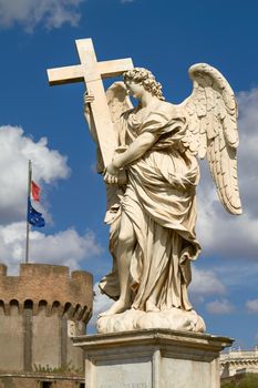 Statue of Angel at Sant Angelo Bridge in Rome Italy with Italian National Flag in the Background