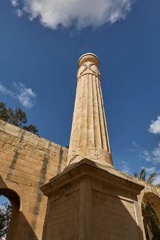 View of a pillar from lower viewpoint at upper Barrakka gardens in Valletta in Malta.