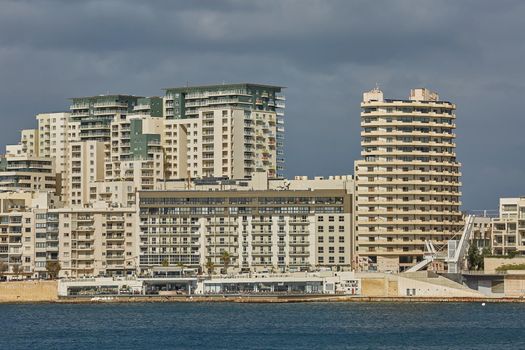 Residential and commercial area at the coastline of Valletta in Malta.
