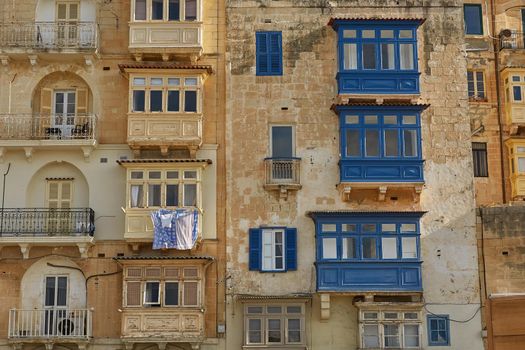 Typical and traditional colorful architecture and houses in Valletta in Malta.