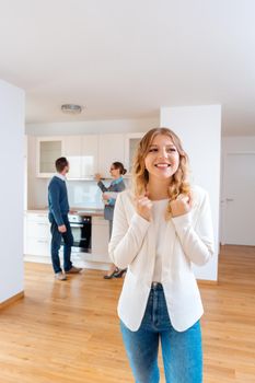 Woman raving about the apartment she and her man are going to rent or purchase