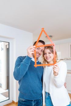 Woman and man having had success in finding a new apartment wanting to move in