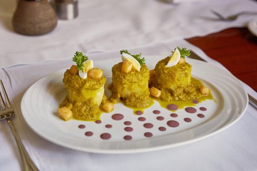 Traditional Peruvian Meal Called Ocopa Arequipena Served in a Restaurant.