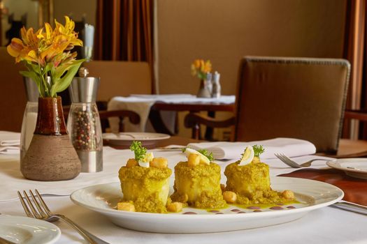 Traditional Peruvian Meal Called Ocopa Arequipena Served in a Restaurant.