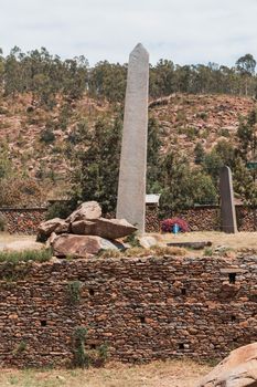 Aksumite civilization ruins, Ancient monolith stone obelisks behind Church of Our Lady of Zion, symbol of the Aksum, Ethiopia. UNESCO World Heritage site.