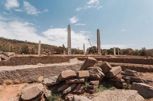 Aksumite civilization ruins, Ancient monolith stone obelisks behind Church of Our Lady of Zion, symbol of the Aksum, Ethiopia. UNESCO World Heritage site.