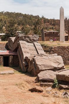 Aksumite civilization ruins, Ancient monolith stone obelisks behind Church of Our Lady of Zion, symbol of the Aksum, Ethiopia. UNESCO World Heritage site.