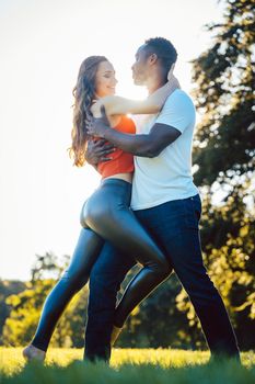 Woman and man expressing themselves through the not so subtle art of dance