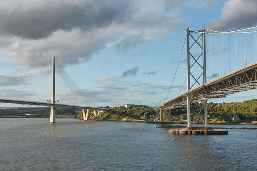 The new Queensferry Crossing bridge over the Firth of Forth with the older Forth Road bridge in Edinburgh Scotland