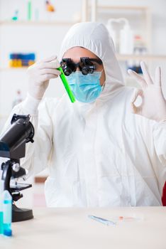 Chemist working on cannabis extract for medical purposes