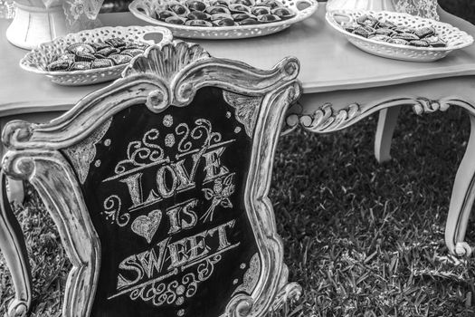 DIY wedding Love is sweet hand written sign