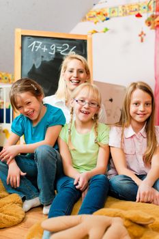 Family - mother with her daughters; all of them going to school already