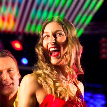 Clubbing and nightlife - Woman in club or bar having fun