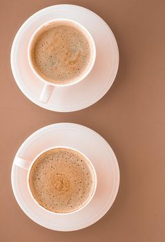 Drinks menu, italian espresso recipe and organic shop concept - Cup of hot coffee as breakfast drink, flatlay cups on beige background