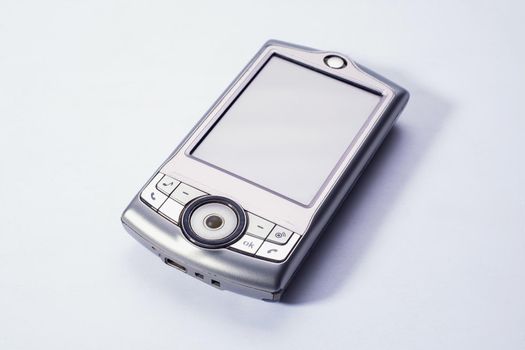 The old mobile phone is out of date. Touch screen. Light background.