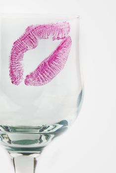 One glass with a kiss with a clean background