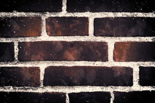 Aged and weathered old brick wall texture in a vintage retro design 