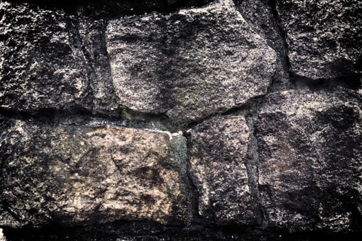 Aged and weathered old brick wall texture in a vintage retro design 