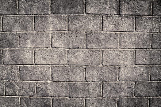 Aged and weathered old brick wall texture in a vintage retro design 