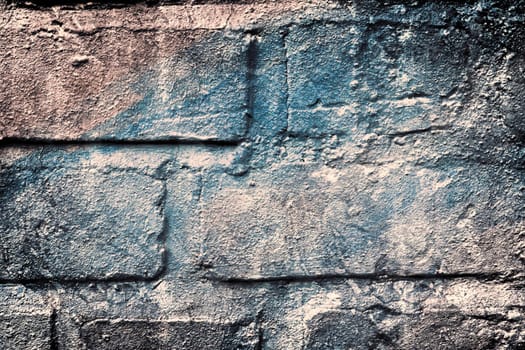 Aged and weathered old brick wall texture in a vintage retro design 