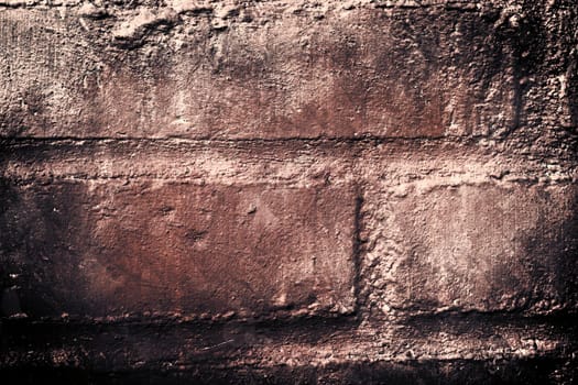 Aged and weathered old brick wall texture in a vintage retro design 