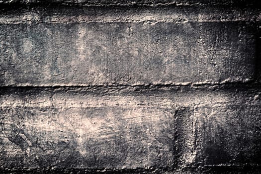 Aged and weathered old brick wall texture in a vintage retro design 