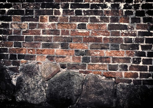 Aged and weathered old brick wall texture in a vintage retro design 