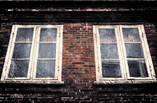 Aged and weathered old brick wall texture in a vintage retro design 