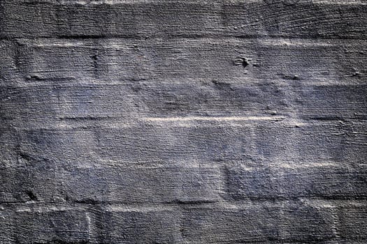 Aged and weathered old brick wall texture in a vintage retro design 