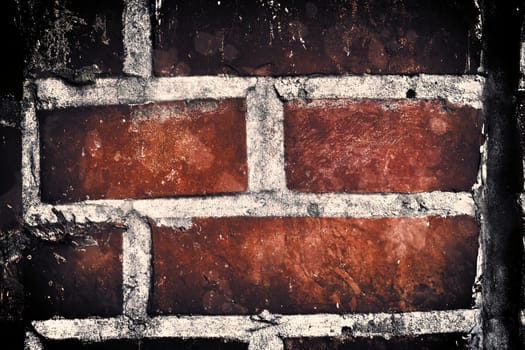 Aged and weathered old brick wall texture in a vintage retro design 