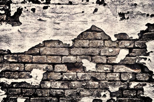 Aged and weathered old brick wall texture in a vintage retro design 