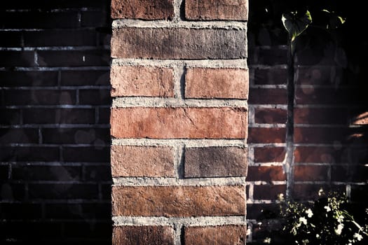 Aged and weathered old brick wall texture in a vintage retro design 