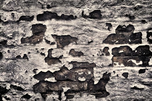 Aged and weathered old brick wall texture in a vintage retro design 