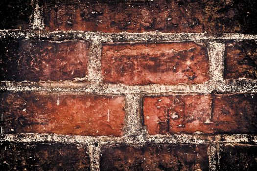 Aged and weathered old brick wall texture in a vintage retro design 