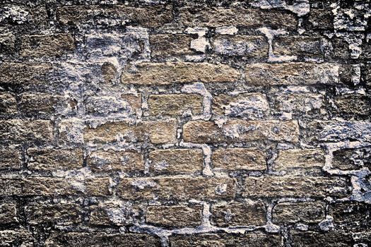 Aged and weathered old brick wall texture in a vintage retro design 